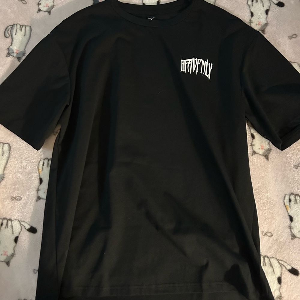 Baggy graphic tee with design on the back